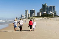 walking people on the beach at Surfers Paradise, Gold Coast, Queensland, Australia