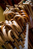 Detail view of walking sticks for sale in the mountain town of Potes in the Picos de Europa national park in northern Spain