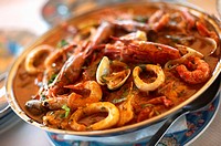 A traditional Cataplana meal at Os Salgados restaurant on Praia Dos Salgados Salgados Beach in the Algarve, Portugal PROPERTY RELEASE AVAILABLE