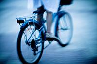 Teenager on bicycle  Motion and blur