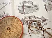 Old medicine book and glasses