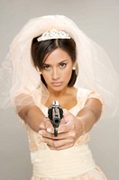 Bride holding a gun