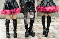 Young girls legs dressed as cosplay goths at Harajuku in central Tokyo Japan