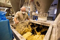 Chelsea, Michigan - A worker at Chelsea Milling Company monitors a mixing machine  The company makes a variety of prepared baking mix products under t...