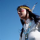 Indigenous woman, america; looking off.