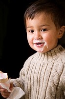 Boy eating icecream in a cone  Iceland