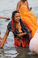 Hindu pilgrims bath in the holy water of Gangasagar island. ( The meeting poing of the Ganges river and the bay of Bengal ).