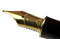 Gold nib of a fountain pen close up isolated on a white background