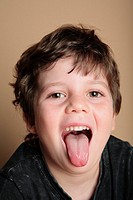 Young boy making faces