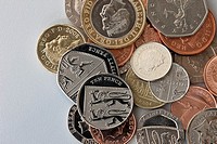 Pile of UK sterling coins in various denominations