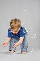 2 year old boy with bubbles
