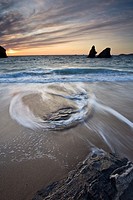 Patterns in the tide at Porthcothan Bay, Cornwall England UK