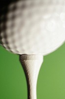 Golf ball on tee, close-up