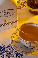 Steaming hot tea in a traditional east frisian cup