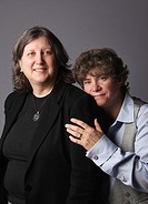 Married lesbian couple portrait looking at camera