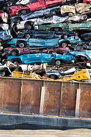 Canada, BC, Barge loaded up with flattened automobiles  Going to scrap metal recycling yard