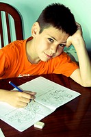 9 years old boy doing homework