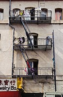 San Francisco, CA - A fire escape serves as a laundry in Chinatown