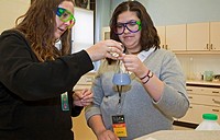 Detroit, Michigan - Laura Torres right, a ninth-grade student, with chemistry teacher Caitie O´Connell at Cristo Rey High School  Students at Cristo R...