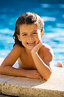 Little caucasian girl in the swimming pool