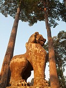 Cambodia - Lion statue at the Bayon, a temple in the centre of Angkor Thom, the ´Great Capital´ of the Khmer empire in Angkor  The temple complexes of...
