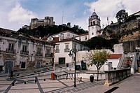 Square in front of the Cathedral of Leiria, Portugal, where is the castle of Leiria in the top left and the tower of the cathedral..