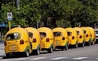 Yellow cocotaxis in Havana, Coco taxis is a typical cheap taxi in Cuba