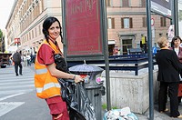 Women emptied garbage cans in Rome