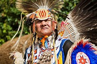 Native American in traditional costume at a powwow in Alberta, Canada