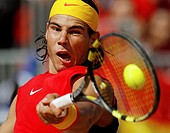 Spain´s Rafael Nadal returns a ball to Italy´s Filippo Volandri during their Davis Cup play-off tennis match in the northern Spanish town of Santander