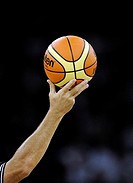 A referee holds a Molten ball during a friendly basketball tour ahead the Beijing 2008 Olympics at the Venetian Macao Resort-Hotel Casino in Macau, Ch...