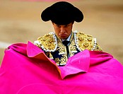 Spanish matador Julian Lopez ´El Juli´ prepares to perform a pass to a bull during the ´San Isidro´ bullfighting fair at ´Las Ventas´ bullring in Madr...