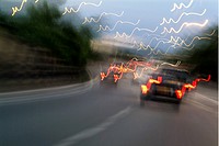 Cars moving on a highway as seen through a blurred windscreen, Paris, France.