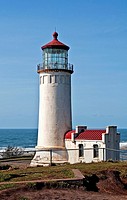 This is the North Head lighthouse off the Pacific ocean in Washington state in Pacific County, with a bright clear blue sky Beautiful lantern room is ...