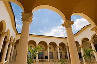 Mediterranean style courtyard with arches and columns forming a portico around the perimeter  Biltmore Hotel, Miami, Florida