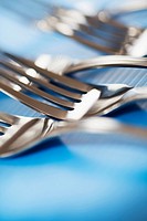 Silverware. Forks detail with selective focus