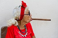 Cuba, old woman smoking cigar