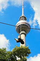 Sneakers on wire with Berlin TV Tower