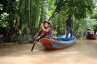 Women rowing. Mekong River, Mekong Delta, My Duc. Vietnam.