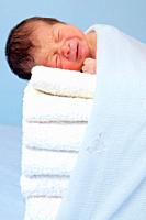 New born on soft towels