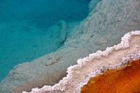 Colourful mineral deposits at Black Pool hot spring in Yellowstone National Park in Wyoming, United States