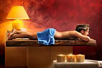 half-naked woman lying in relaxation area