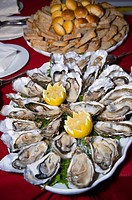 Oysters on table with bread