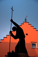 Silhouette of a religious statue at Fussen in the Romantic road, Bavaria, Germany