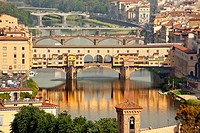Ponte Vecchio Covered Bridge Arno River Reflection Florence Italy Bridge is the oldest bridge in Florence built in 1345 by Neri di Fioravante from Mic...