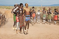 Karo people with body paintings participating in a tribal dance ceremony, Omo river Valley, Southern Ethiopia
