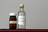 Two old bottles containing Holy Water