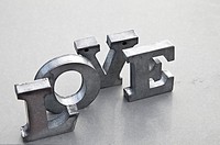 message of love with metal letters