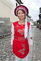 Bai woman wearing a colourful traditional Bai costume, Dali, Yunnan Province, China