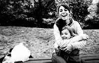Mother and daughter laughing